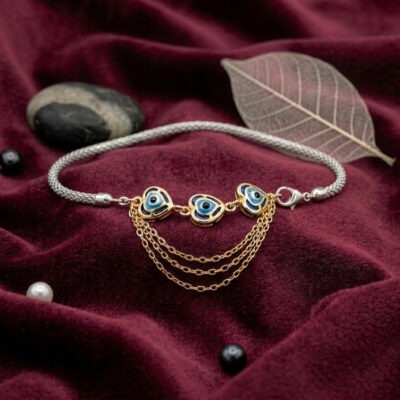 Dual-tone silver bracelet for women with blue evil eye charms and braided chain